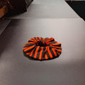Orange and black striped Halloween hair tie