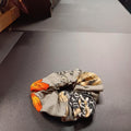 Cotton Halloween print hair tie in gray black and orange
